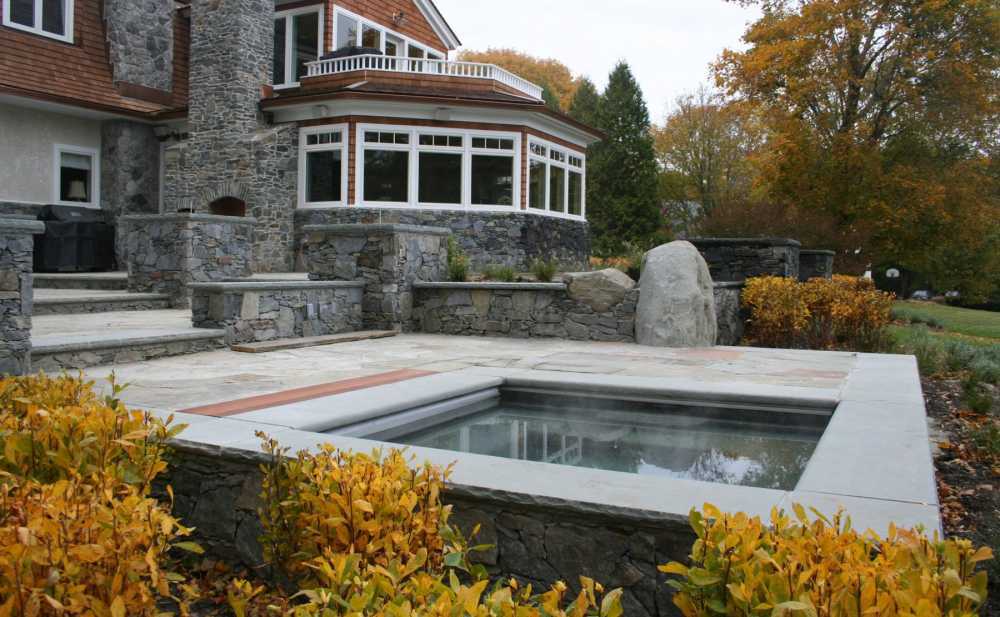 Atlantic won first place for this project in the RINLA awards for residential hardscape.  This project includes fieldstone walls, hot tub, and surrounding patio.